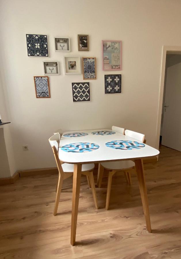 Tm Aparts Dortmund Exteriér fotografie A dining room table with placemats