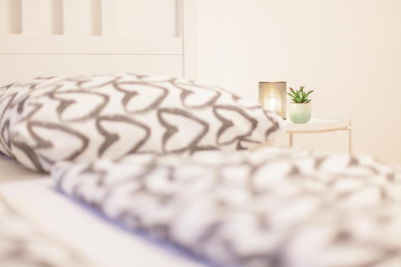 Tm Aparts Dortmund Exteriér fotografie A bed with a throw